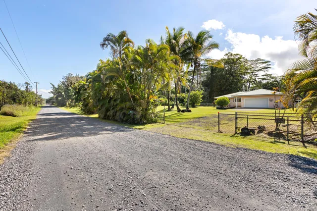 a view of a playground with basketball court
