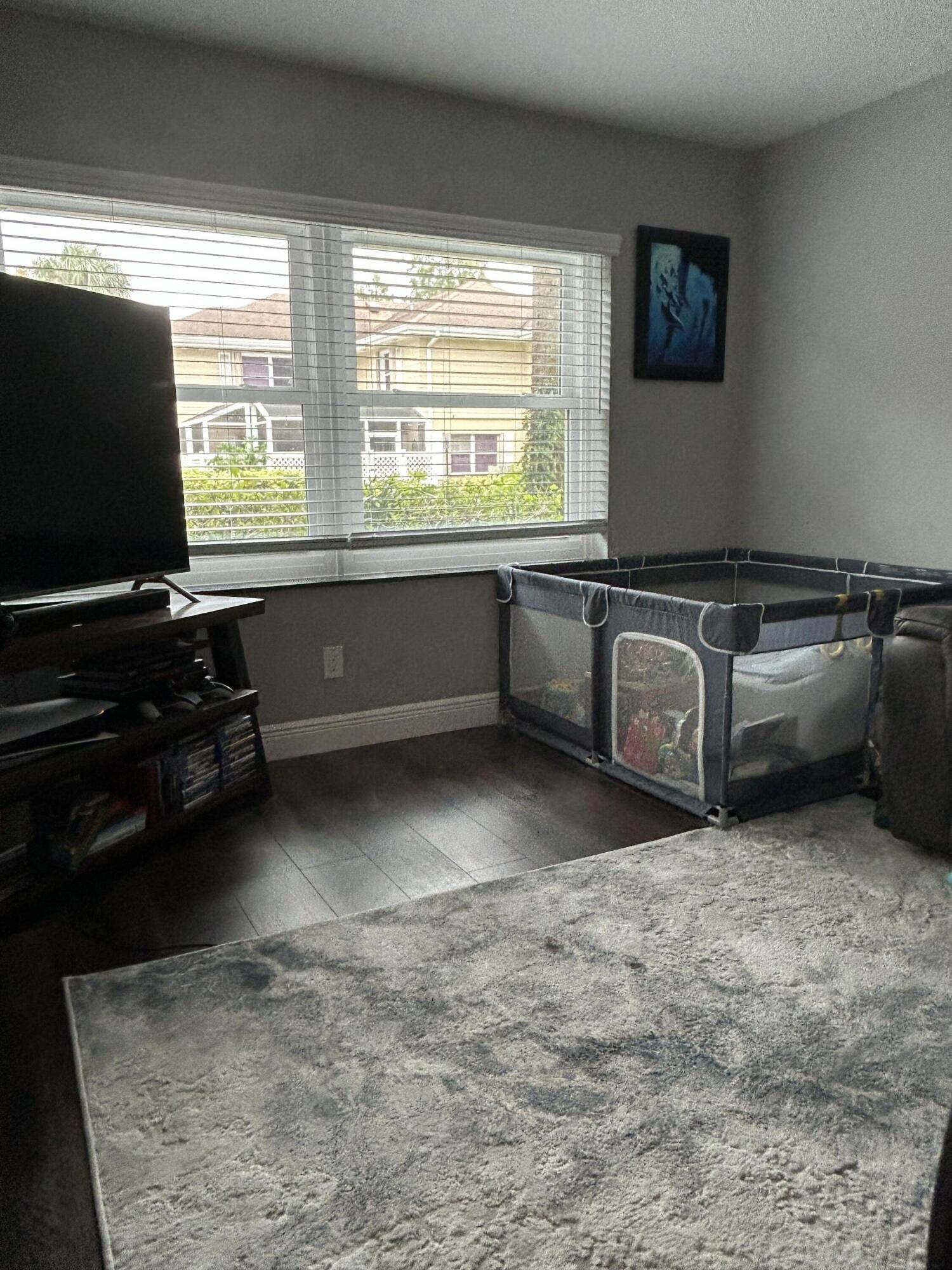 4802 Roxbury Court Boynton Beach, FL 33436 - Photo 5 of 23 a kitchen with granite countertop a stove and a sink