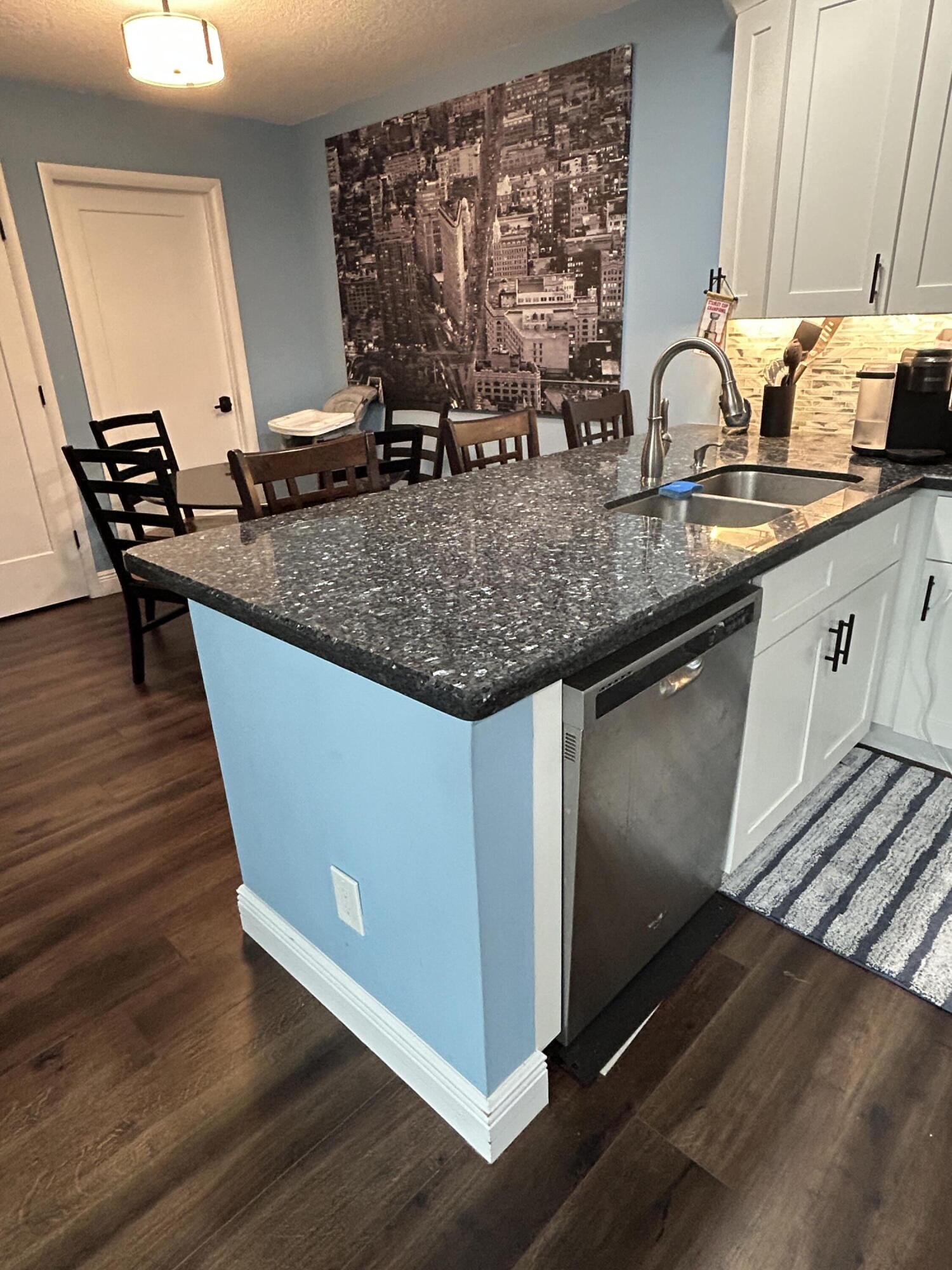 4802 Roxbury Court Boynton Beach, FL 33436 - Photo 6 of 23 a kitchen with granite countertop a sink and a stove