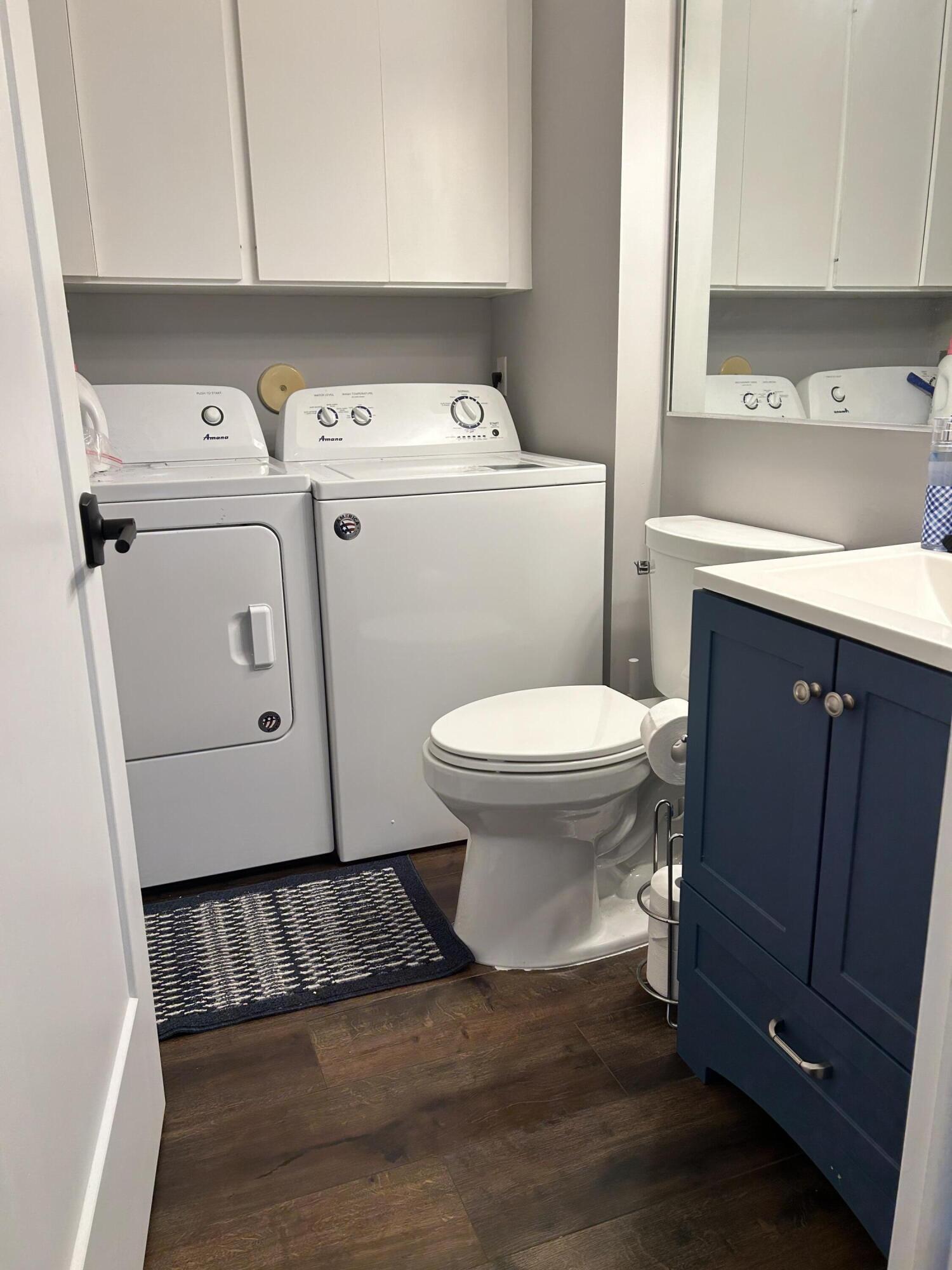4802 Roxbury Court Boynton Beach, FL 33436 - Photo 9 of 23 a utility room with dryer and washer