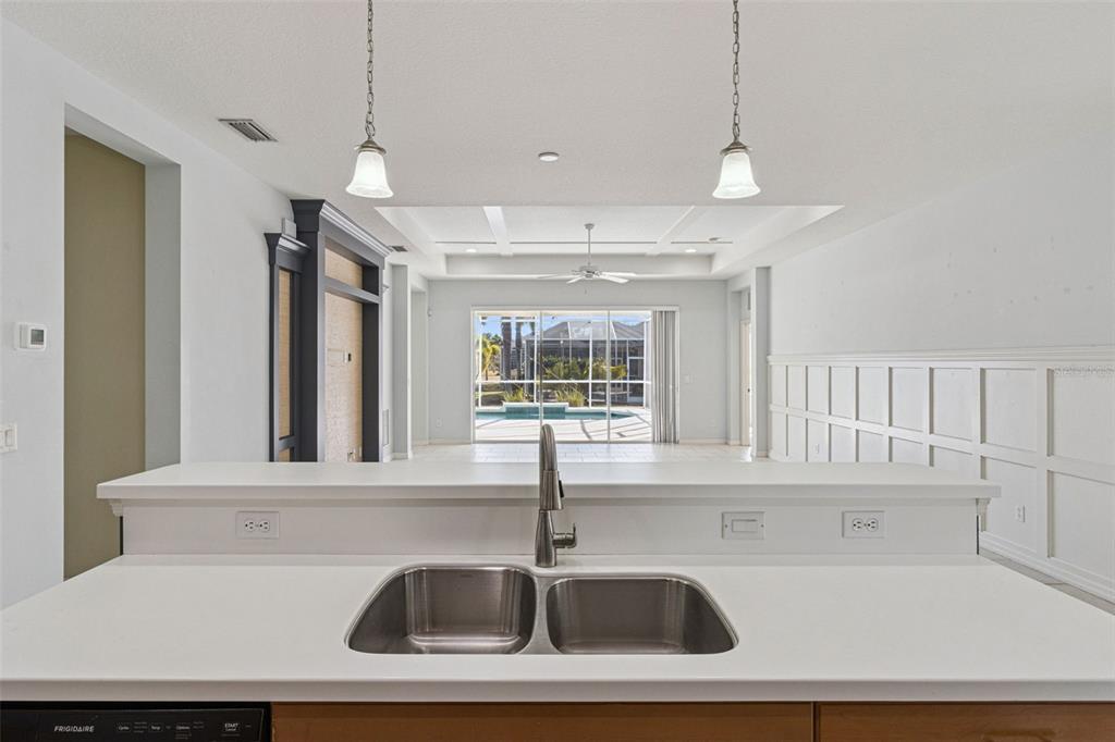 5312 Tide Point Way Bradenton, FL 34208 - Photo 11 of 40 a kitchen with a sink and a window