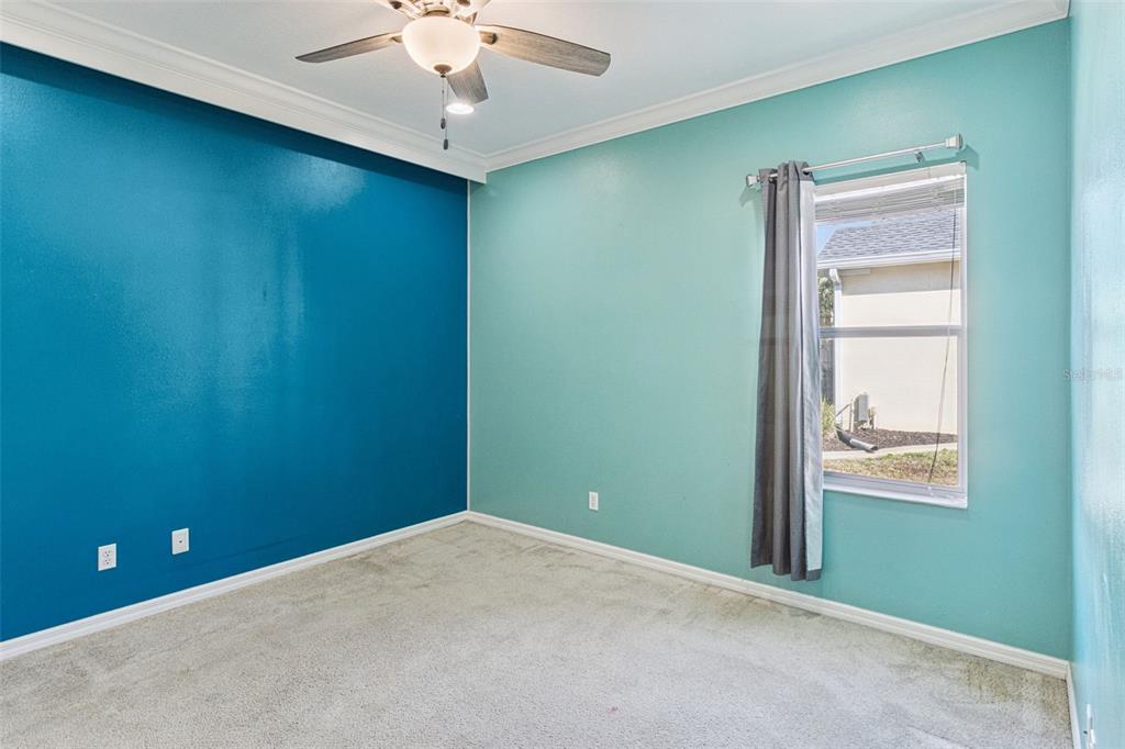 5312 Tide Point Way Bradenton, FL 34208 - Photo 25 of 40 an empty room with windows and closet