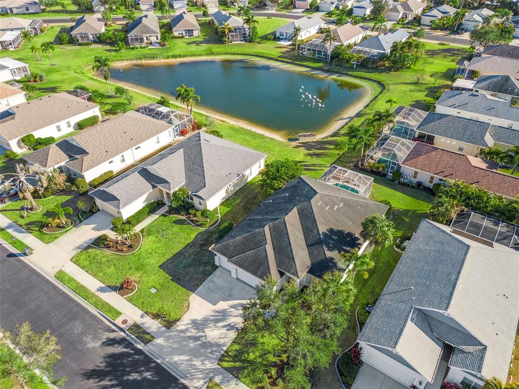 5312 Tide Point Way Bradenton, FL 34208 - Photo 32 of 40 an aerial view of a house with a garden and swimming pool
