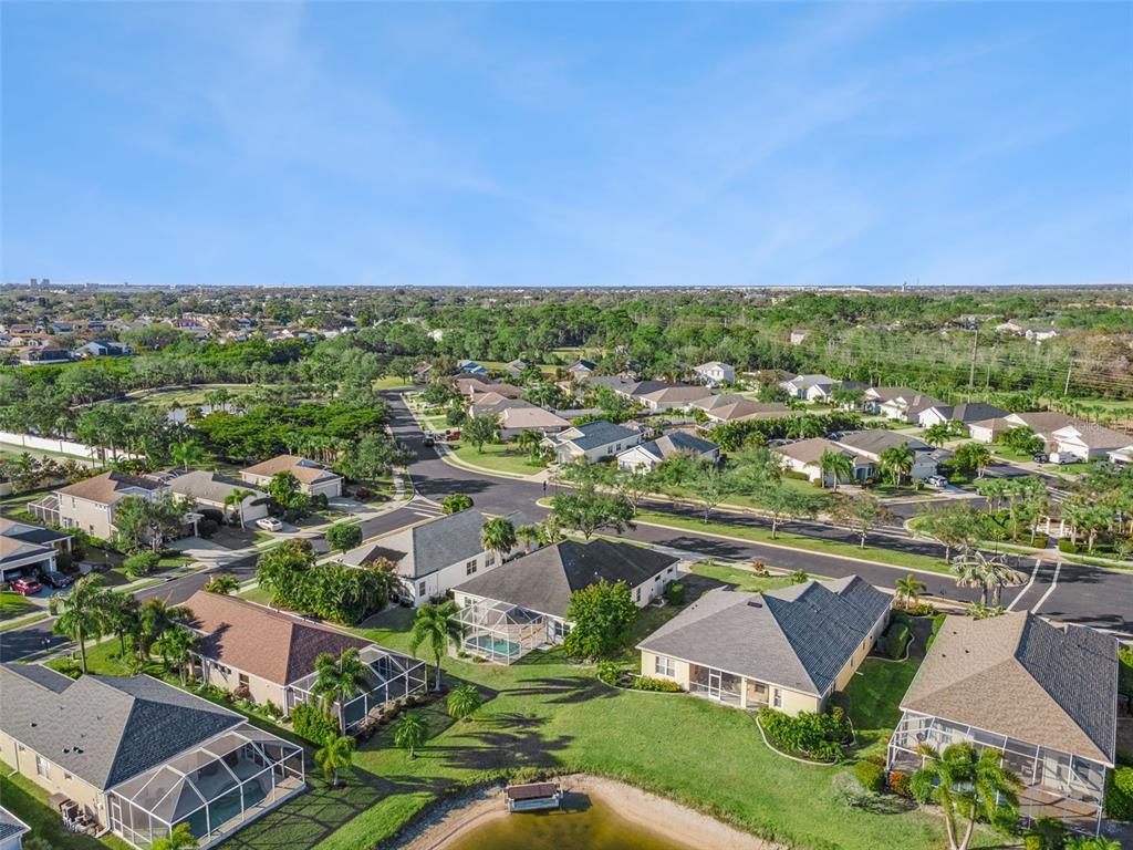 5312 Tide Point Way Bradenton, FL 34208 - Photo 34 of 40 an aerial view of residential houses with outdoor space and trees
