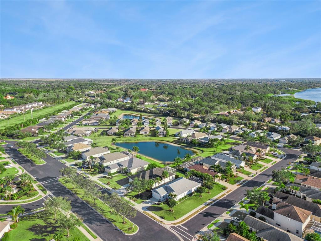 5312 Tide Point Way Bradenton, FL 34208 - Photo 35 of 40 an aerial view of residential houses with outdoor space and street view