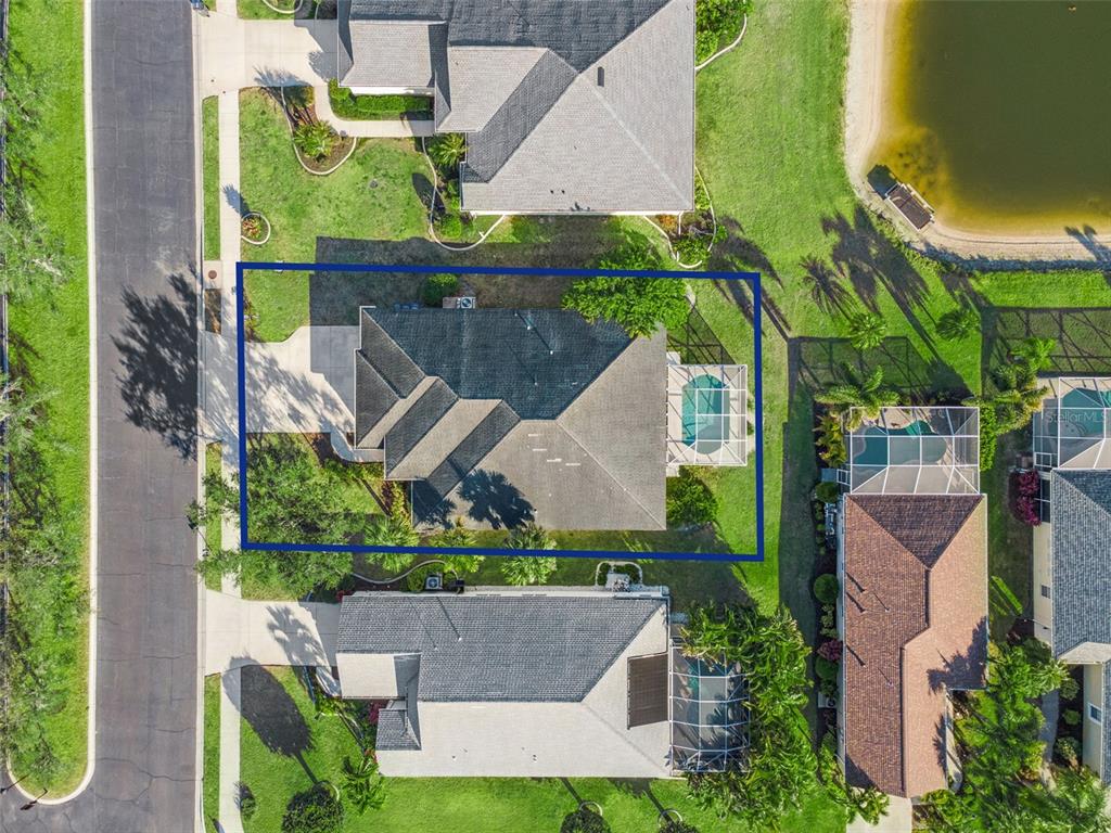 5312 Tide Point Way Bradenton, FL 34208 - Photo 37 of 40 an aerial view of a house with a garden and plants
