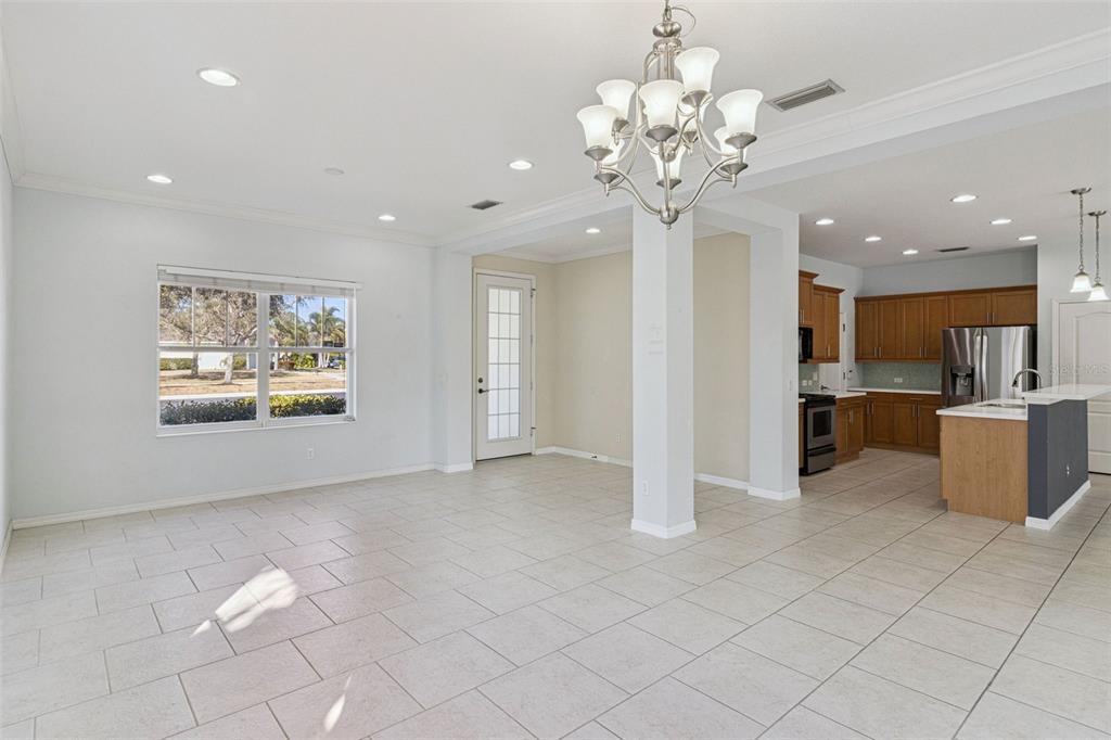 5312 Tide Point Way Bradenton, FL 34208 - Photo 7 of 40 a view of a kitchen with a sink stainless steel appliances and cabinets
