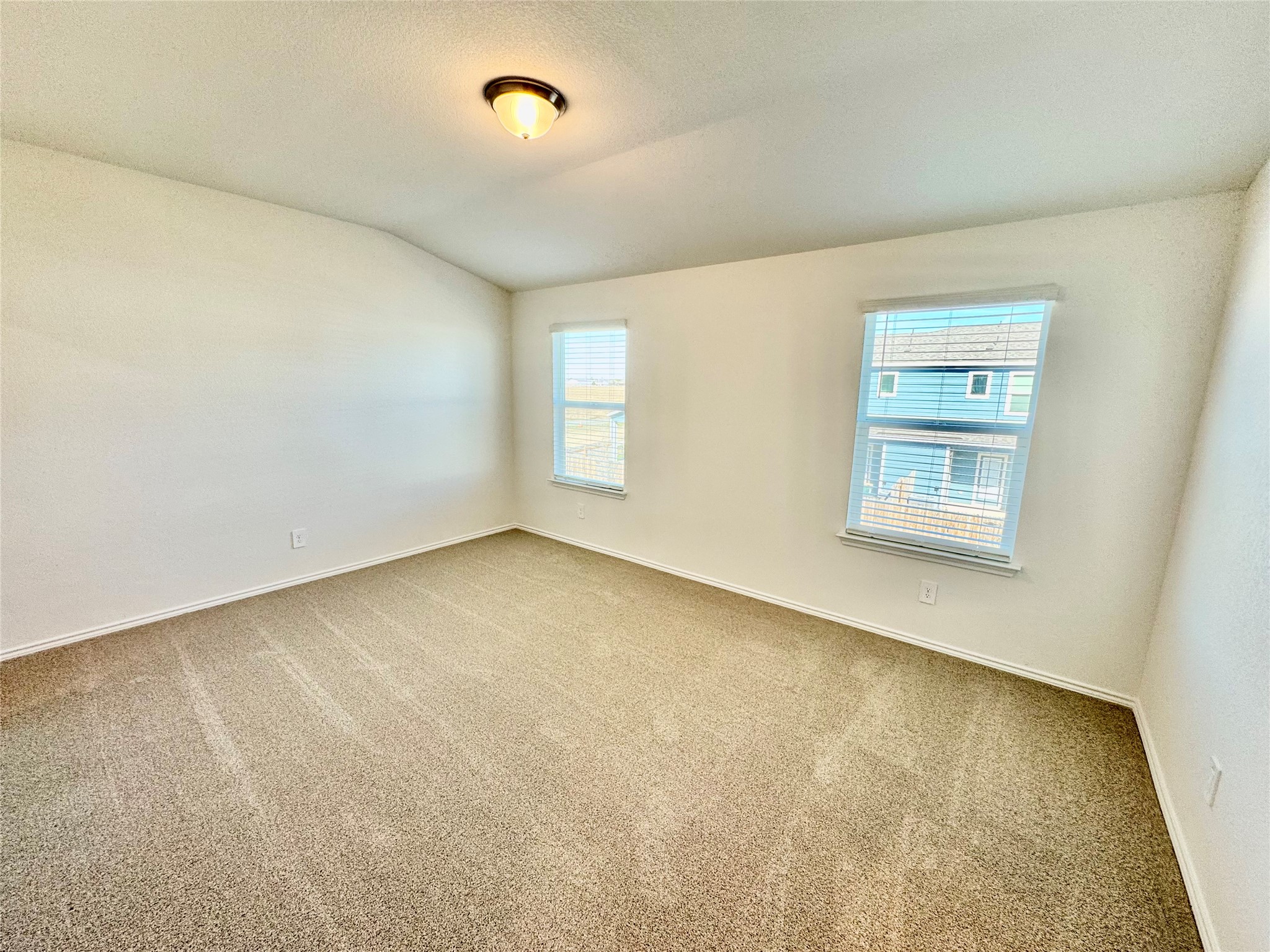 105 Calcite Road, Unit 3 Kyle, TX 78640 - Photo 4 of 7 an empty room with a window