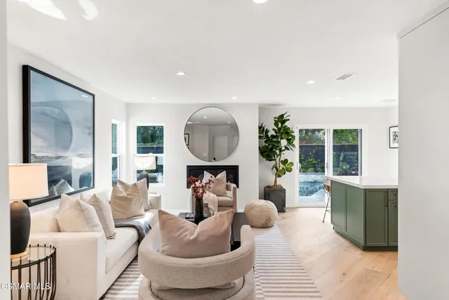 a kitchen with a sink and stove