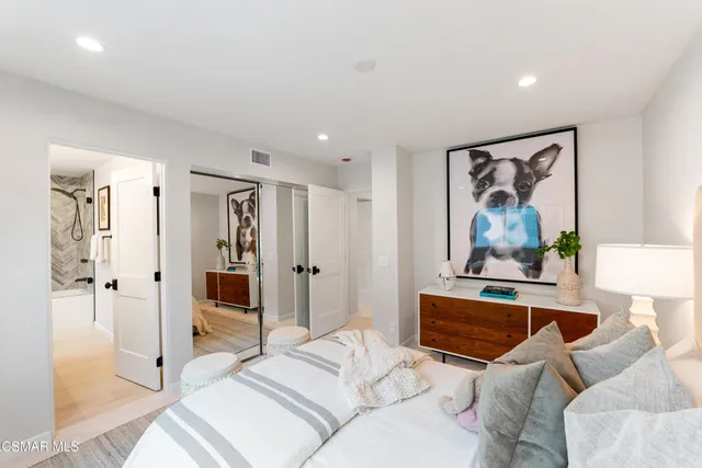 a view of a patio with couches table chairs and a fire pit