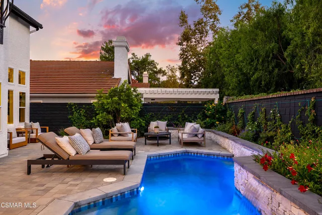 a outdoor living space with furniture and garden view