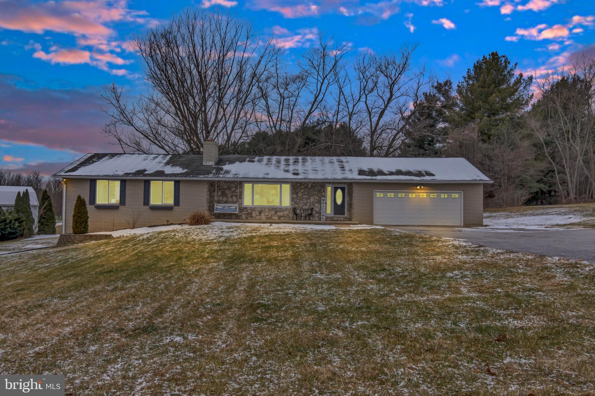 Charming home under a twilight sky.
