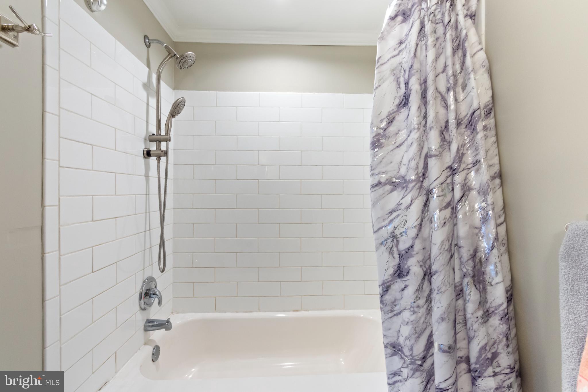 620 South Frizzellburg Road Westminster, MD 21158 - Photo 17 of 64 Modern bathroom with elegant tile accents.