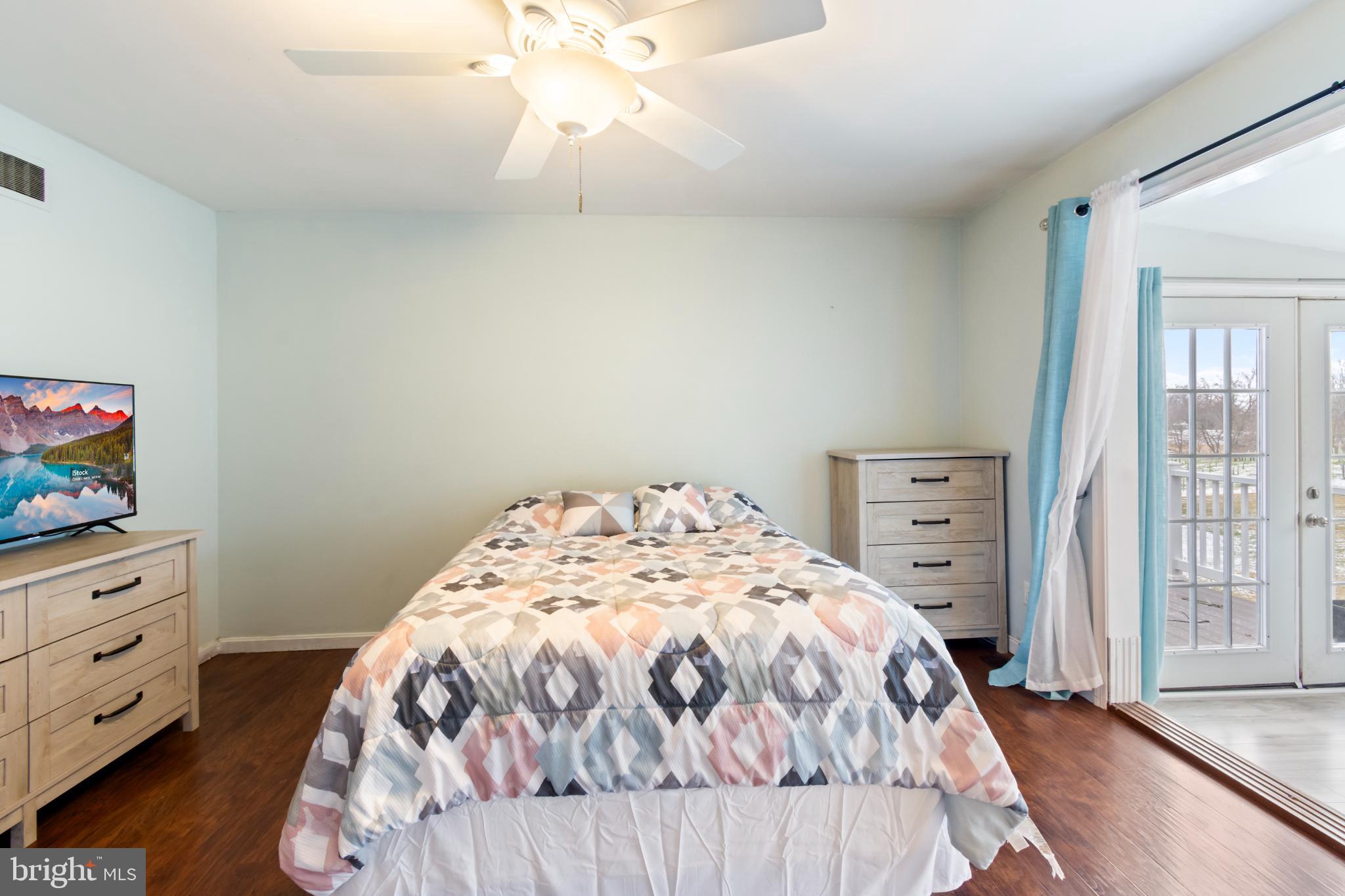 620 South Frizzellburg Road Westminster, MD 21158 - Photo 20 of 64 Bright and airy bedroom with outdoor access.
