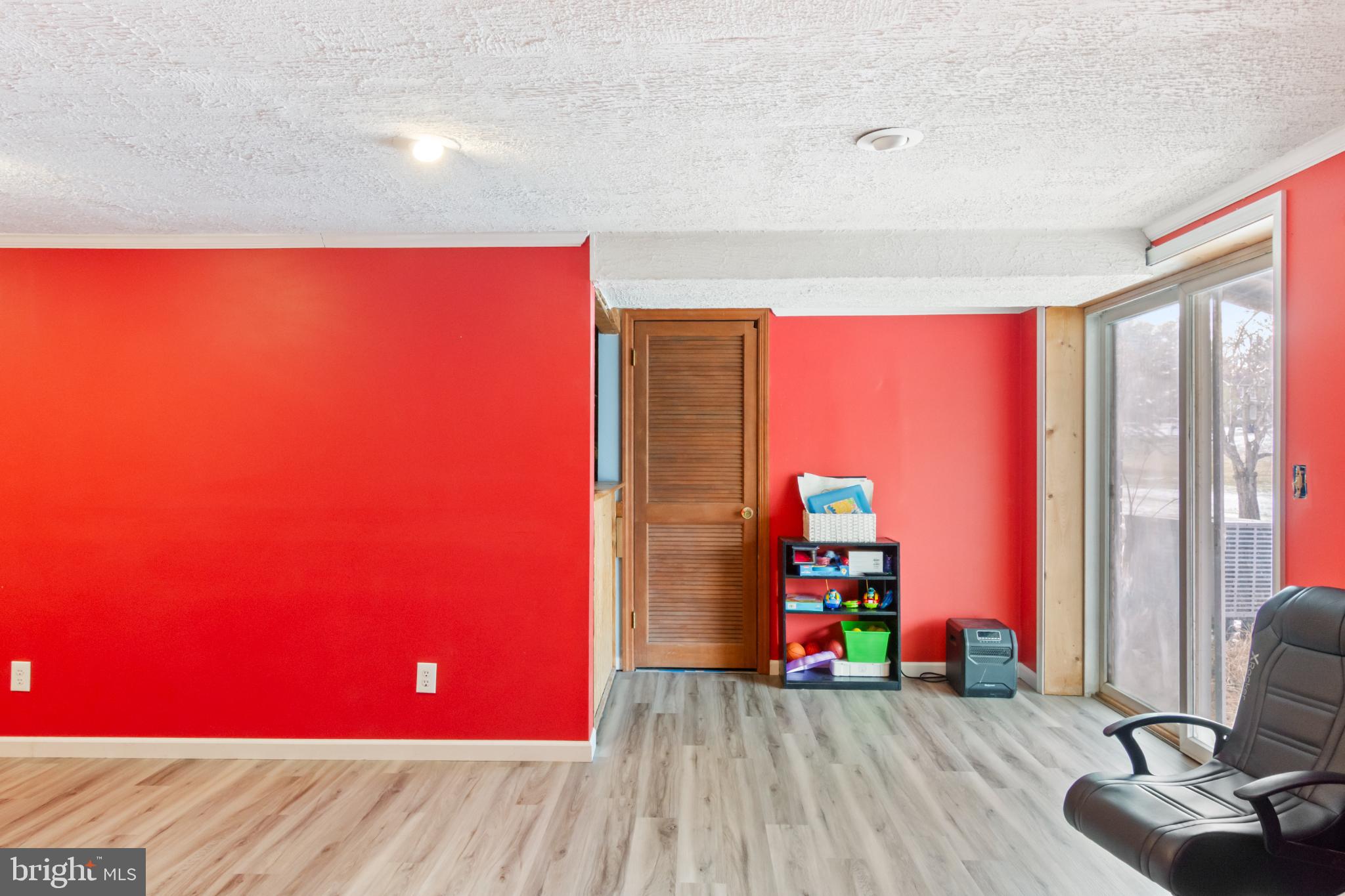 620 South Frizzellburg Road Westminster, MD 21158 - Photo 44 of 64 Vibrant red walls enhance this inviting space.