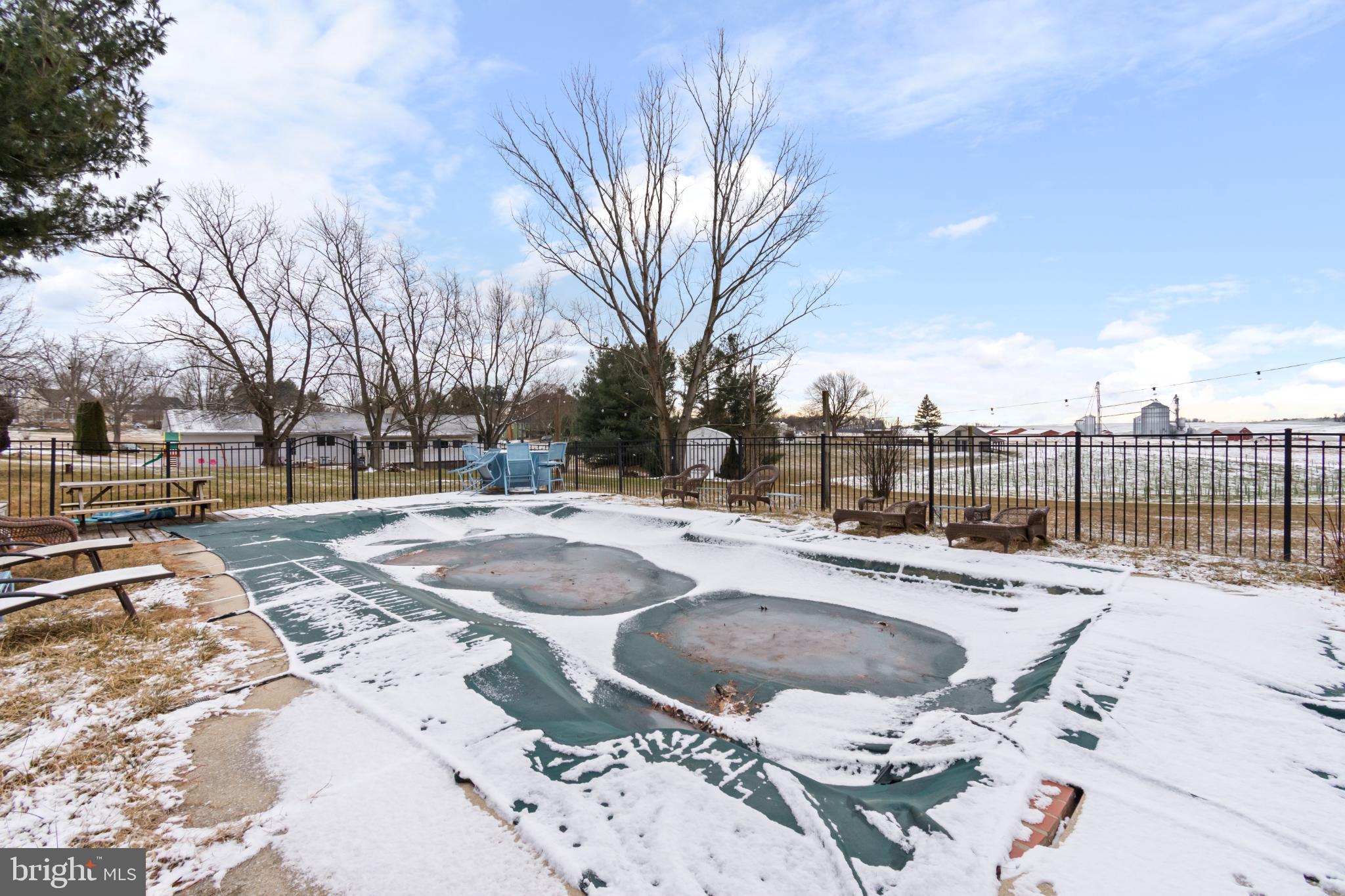 620 South Frizzellburg Road Westminster, MD 21158 - Photo 50 of 64 Winter's embrace over a dormant poolside.