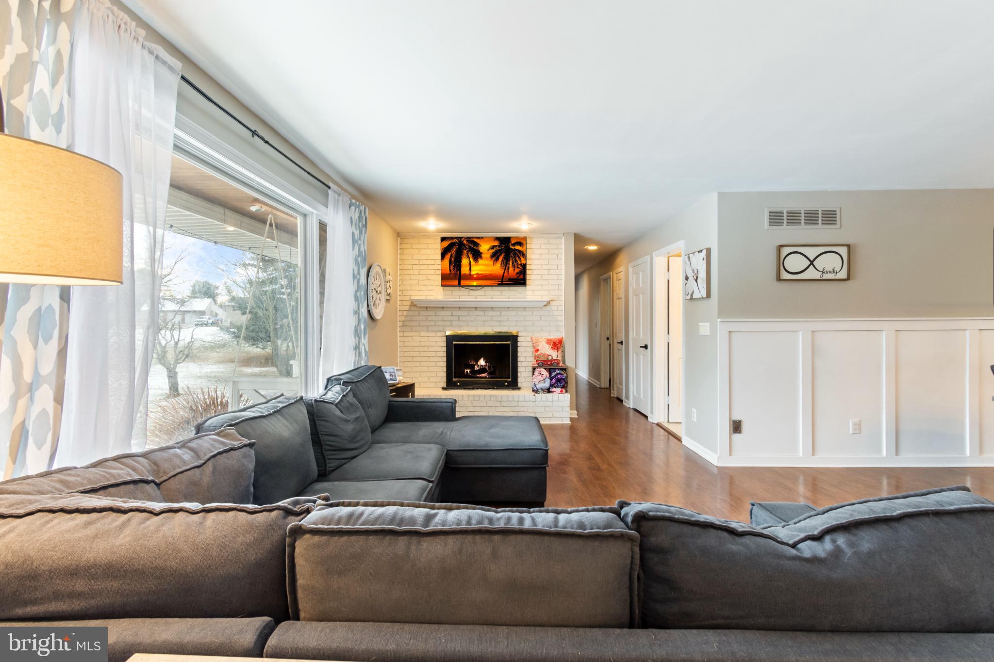 620 South Frizzellburg Road Westminster, MD 21158 - Photo 5 of 64 Inviting living space with cozy fireplace.