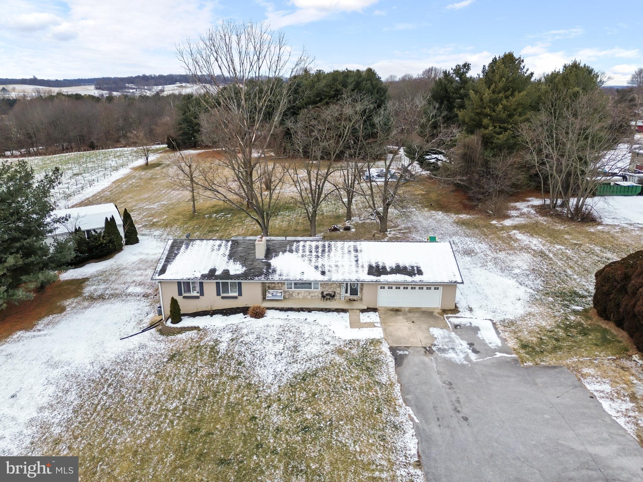 620 South Frizzellburg Road Westminster, MD 21158 - Photo 59 of 64 Charming home nestled in a winter landscape.