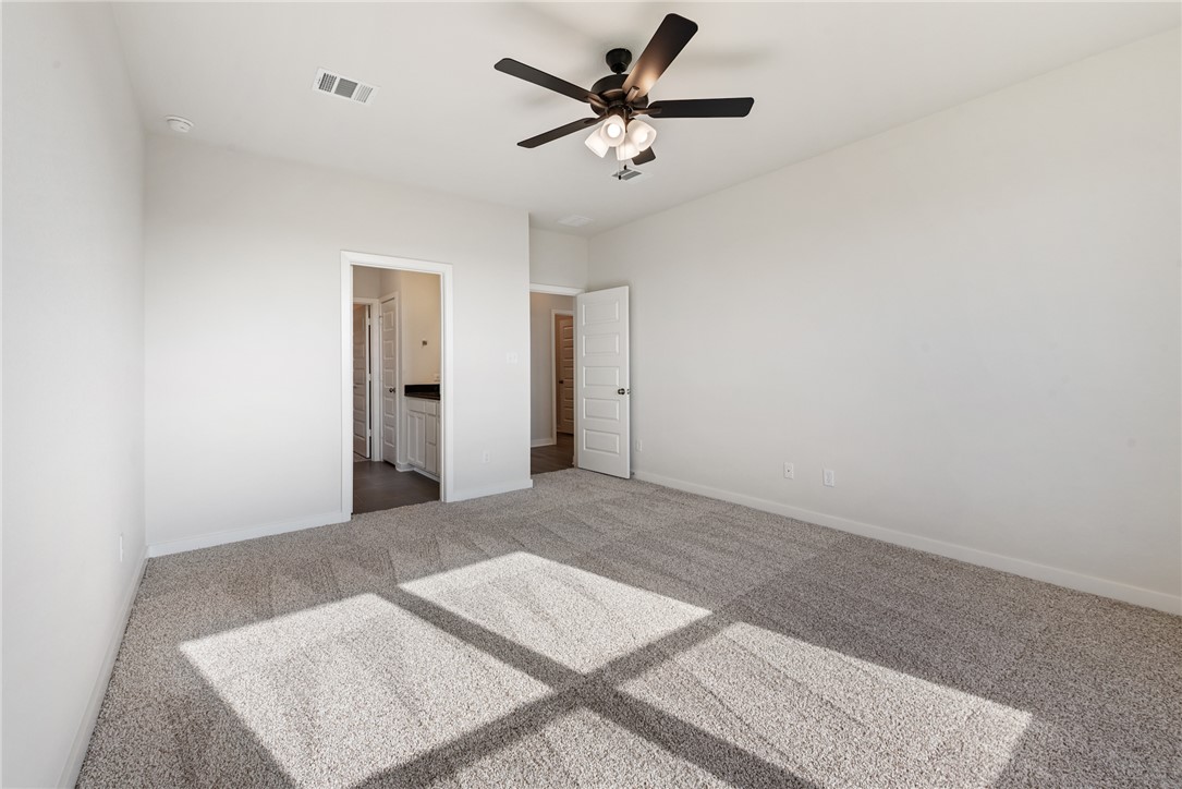 2415 Rooke Road Bryan, TX 77807 - Photo 27 of 36 a view of a big room with carpet