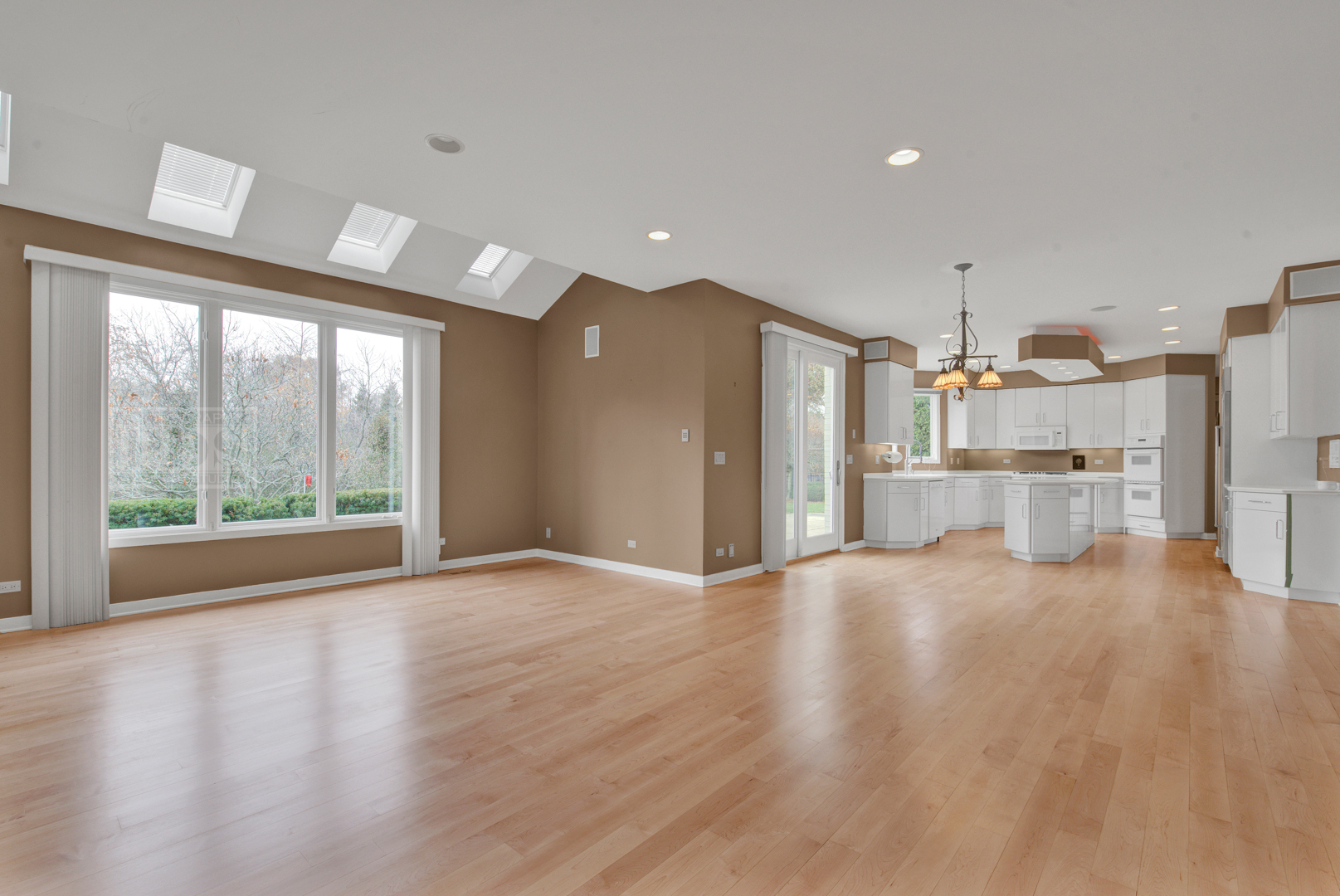 2067 Sheridan Road Buffalo Grove, IL 60089 - Photo 14 of 53 a view of a kitchen with wooden floor and a window