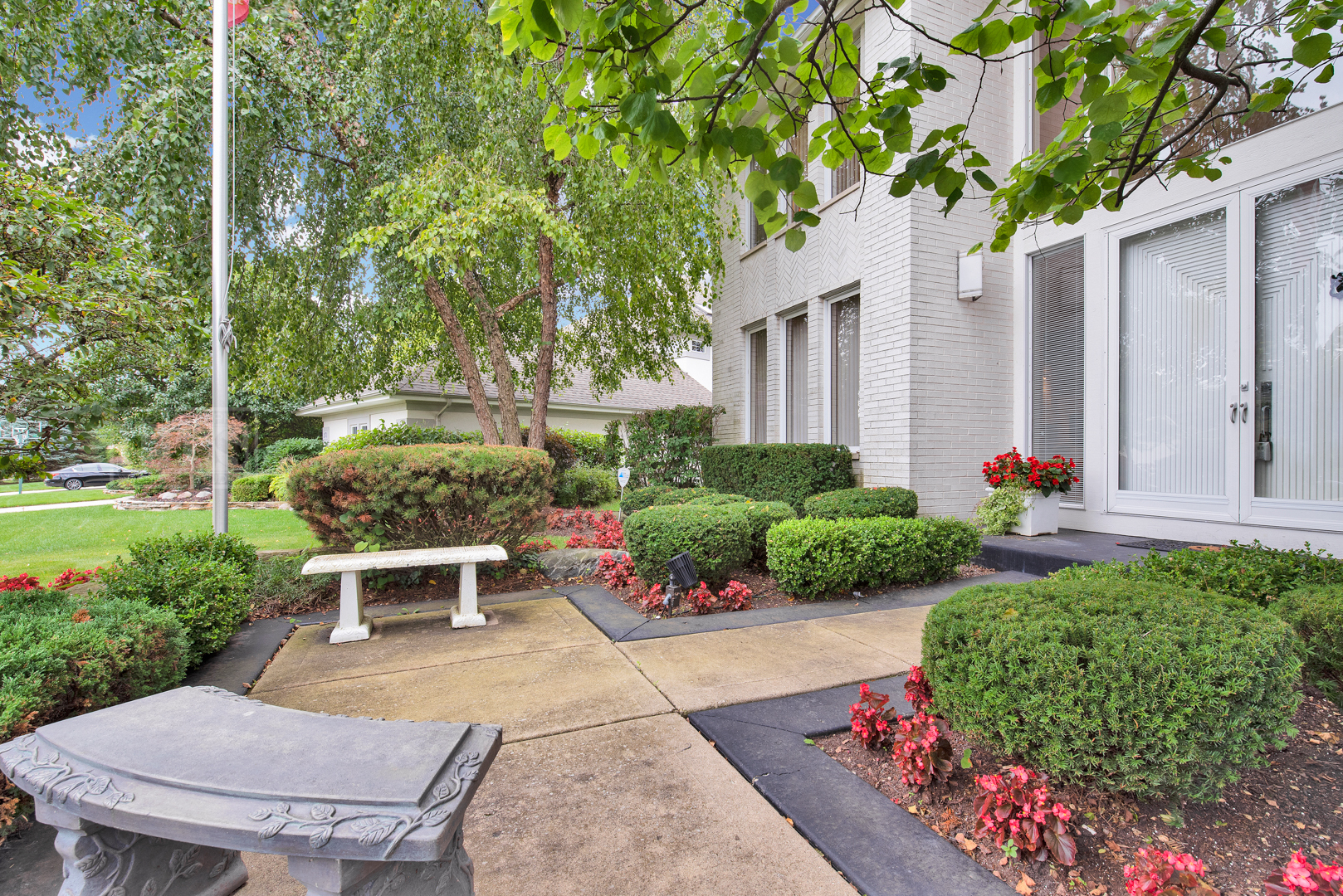 2067 Sheridan Road Buffalo Grove, IL 60089 - Photo 3 of 53 a view of a backyard with sitting area
