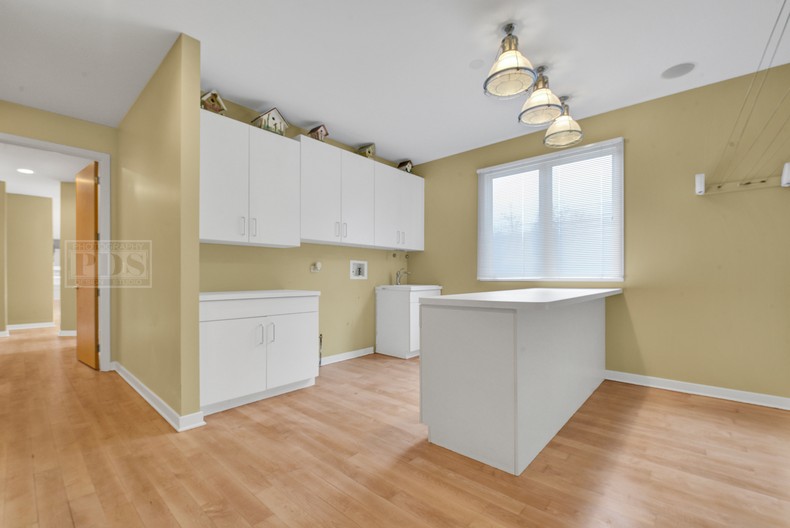 2067 Sheridan Road Buffalo Grove, IL 60089 - Photo 21 of 53 a view of a kitchen with wooden floor and electronic appliances