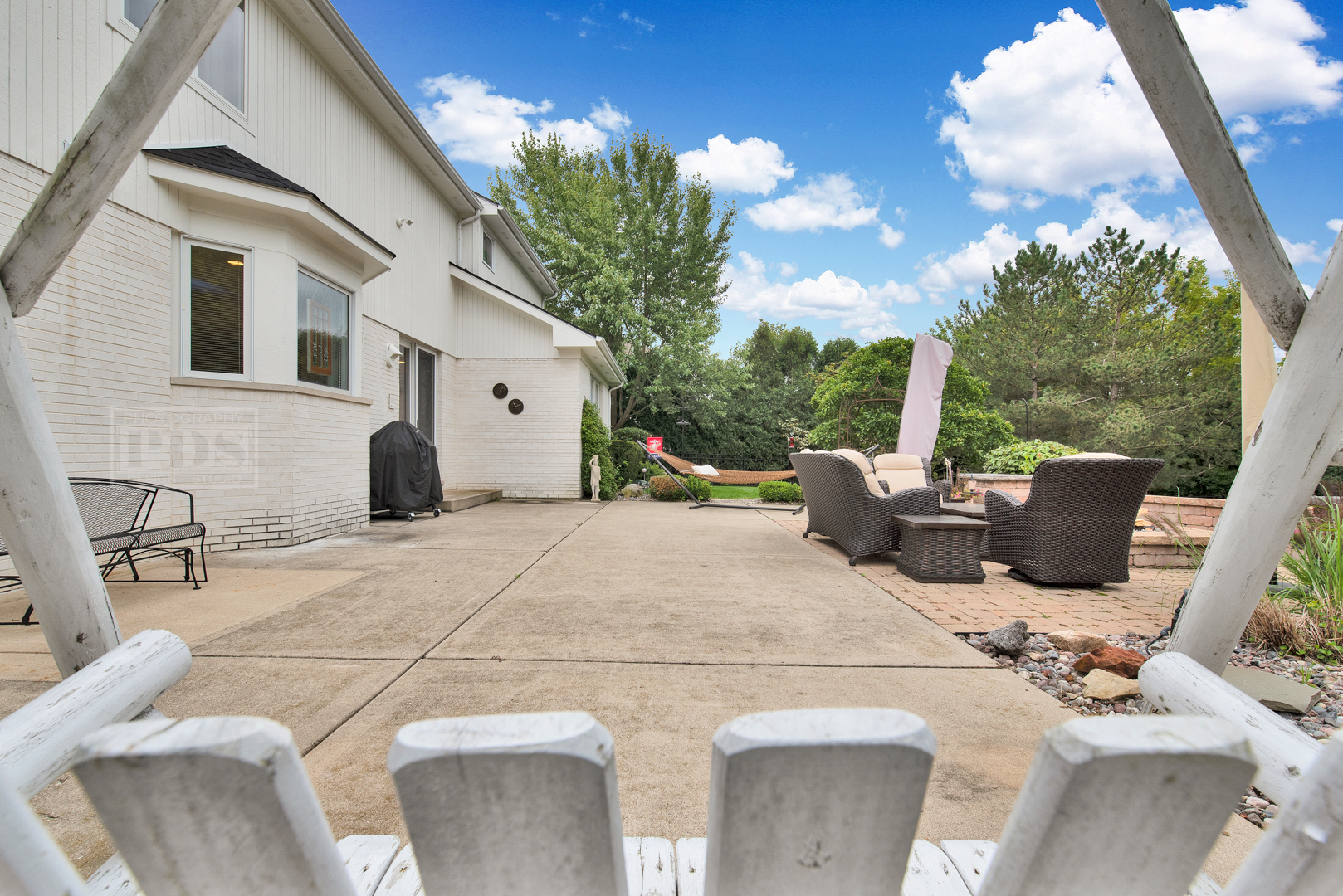 2067 Sheridan Road Buffalo Grove, IL 60089 - Photo 47 of 53 a view of a patio with couches table and chairs and potted plants