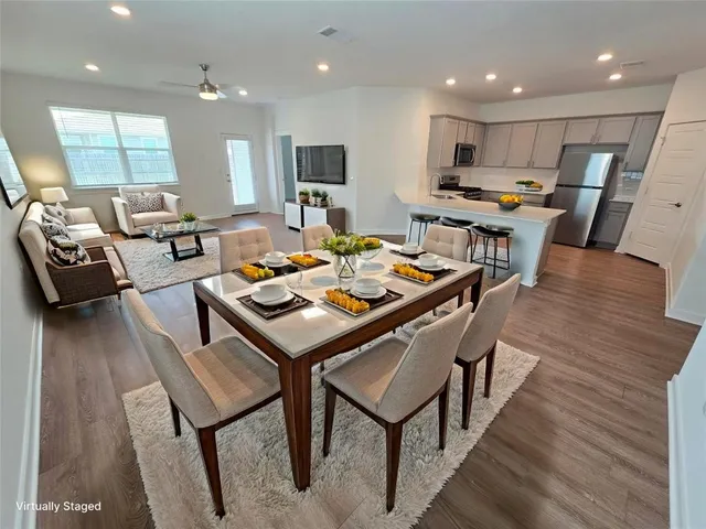 a view of a dining room with furniture