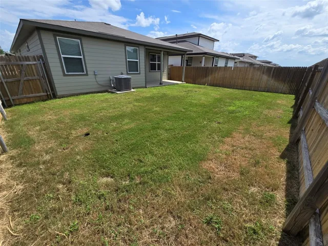 a view of city from terrace with seating area