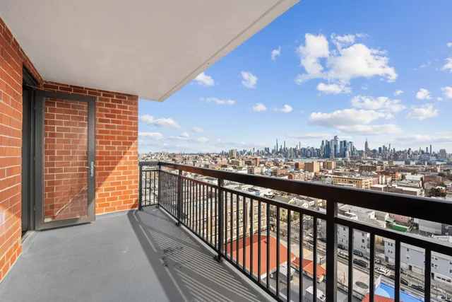 a view of city from a balcony