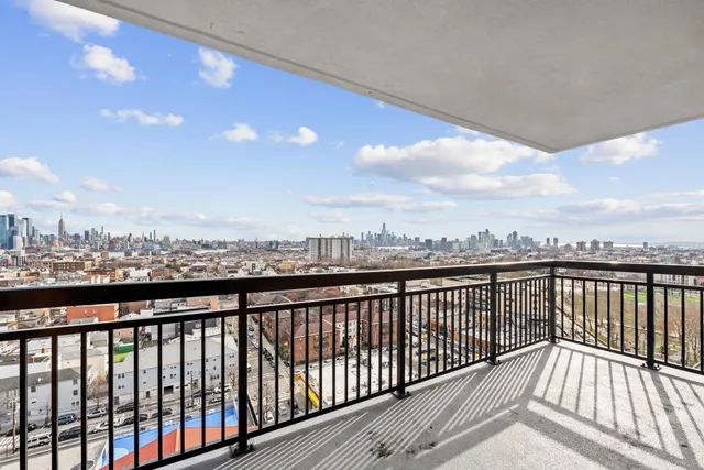 a view of city from a balcony