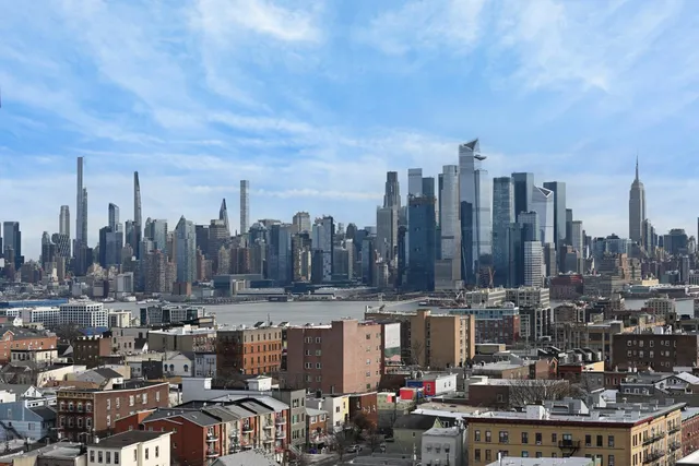 a view of a city with tall buildings