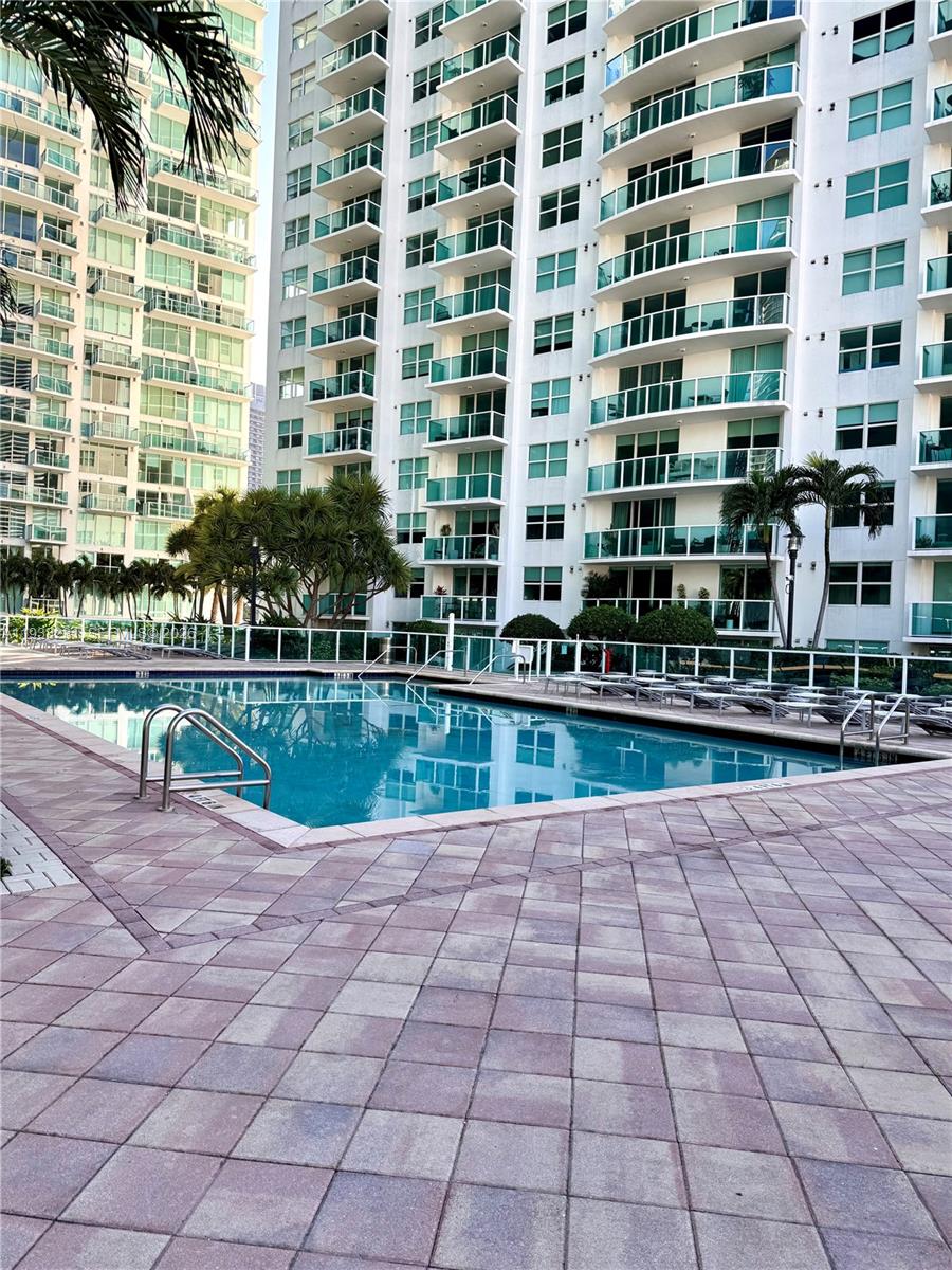 31 Southeast 5th Street, Unit 2710 Miami, FL 33131 - Photo 13 of 25 a view of a building with a yard