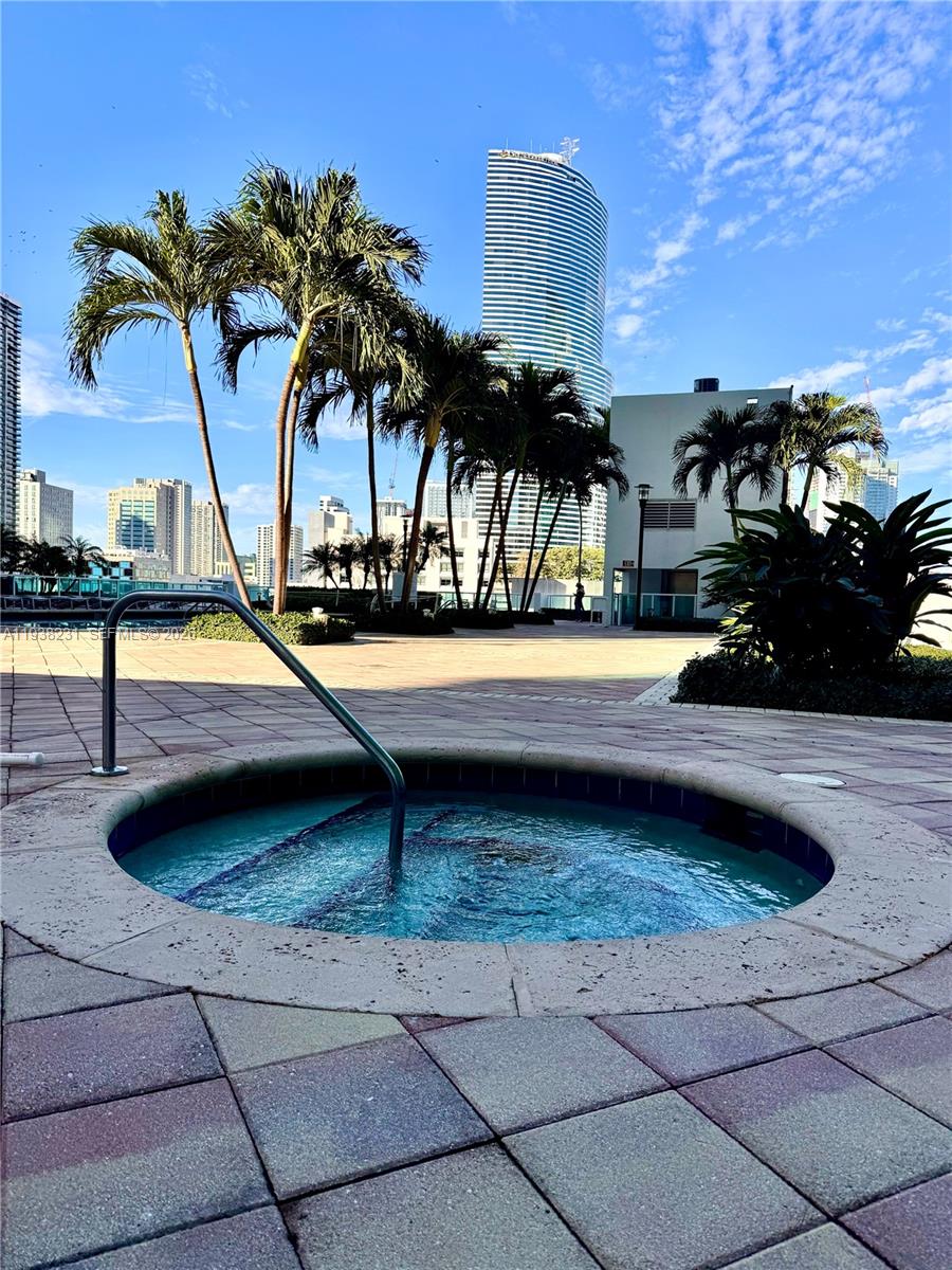 31 Southeast 5th Street, Unit 2710 Miami, FL 33131 - Photo 15 of 25 a view of a patio with swimming pool