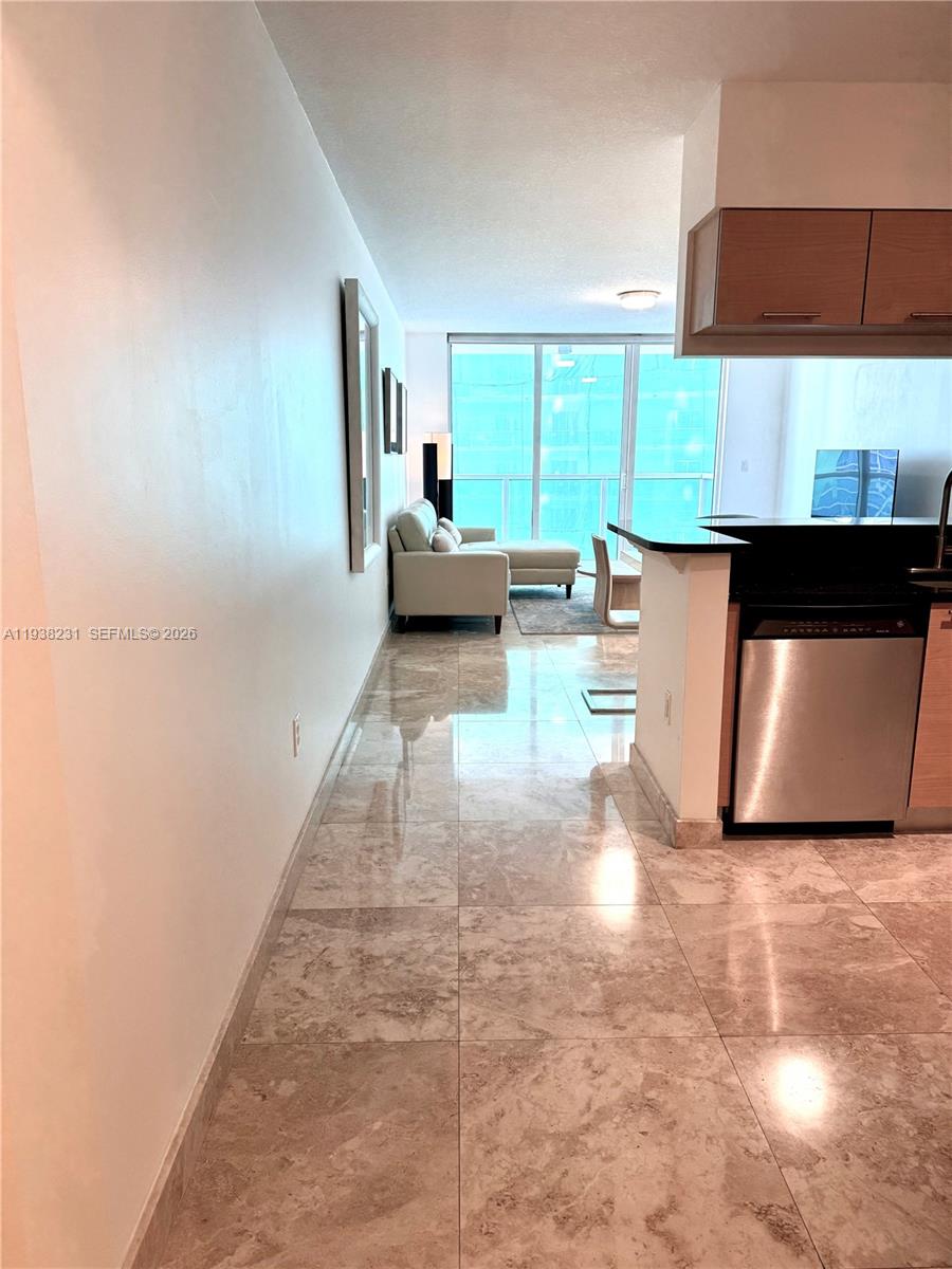 31 Southeast 5th Street, Unit 2710 Miami, FL 33131 - Photo 2 of 25 a view of a kitchen with a sink