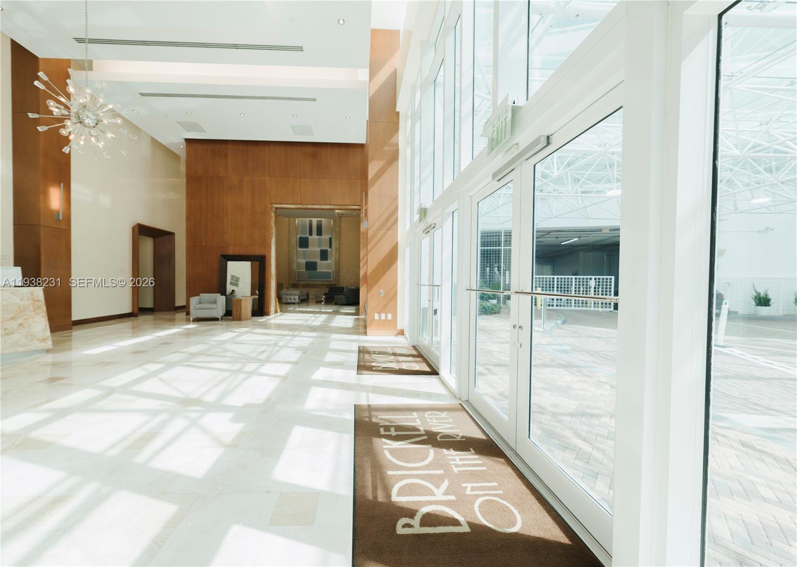 31 Southeast 5th Street, Unit 2710 Miami, FL 33131 - Photo 22 of 25 a view of a hallway with a outdoor space