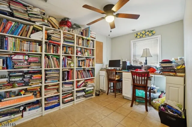 a view of a workspace with furniture