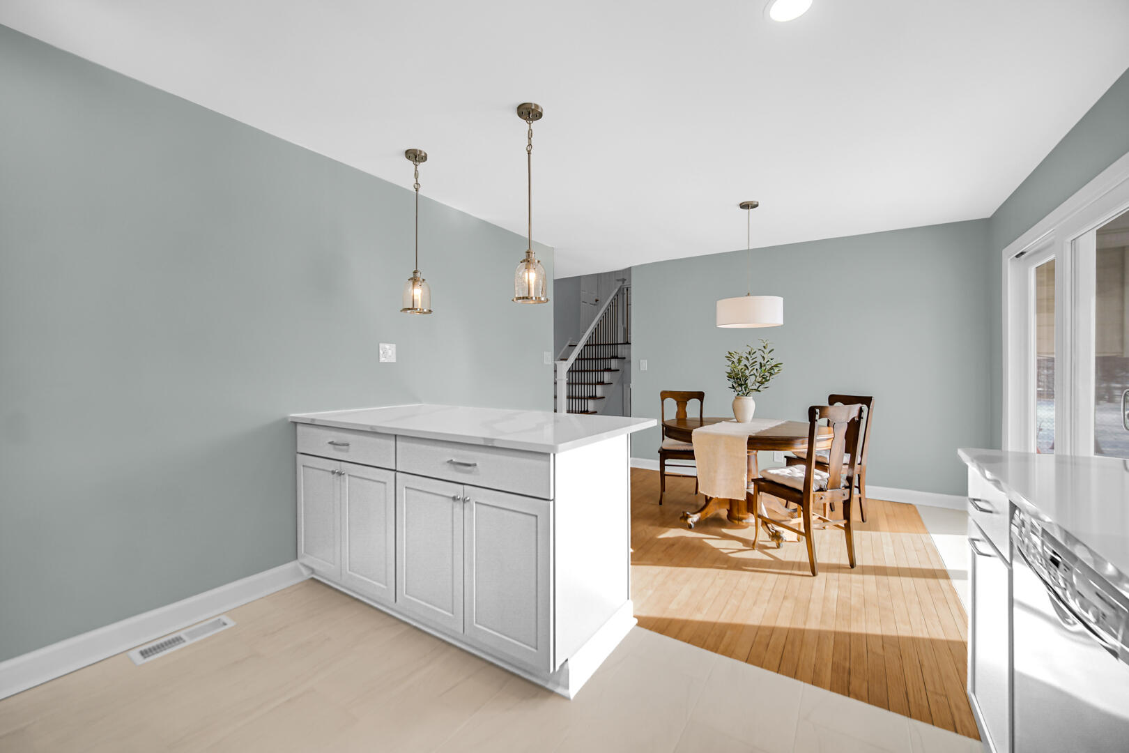 1515 West 94th Avenue Crown Point, IN 46307 - Photo 14 of 23 a view of a kitchen with furniture and wooden floor