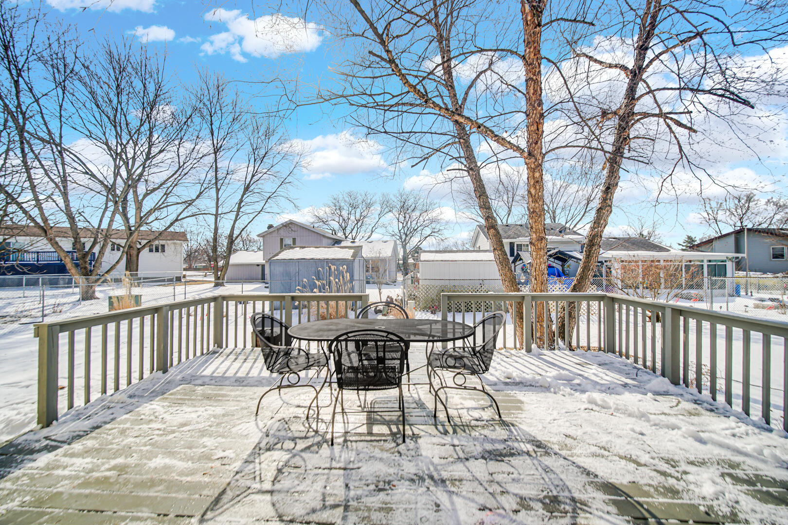 1515 West 94th Avenue Crown Point, IN 46307 - Photo 6 of 23 a view of a chairs and tables on the roof