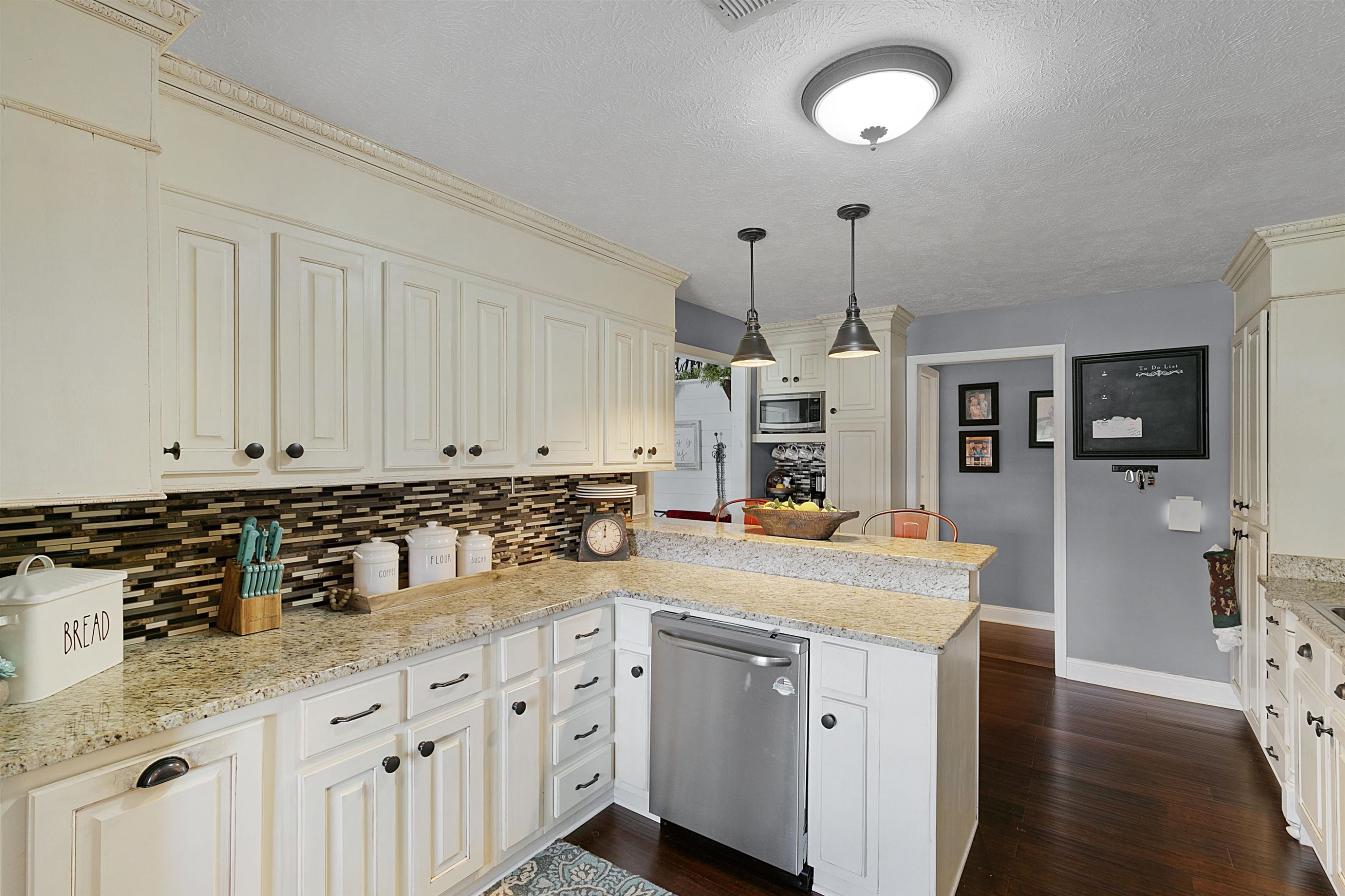5265 Winding Ridge Road Adamsville, TN 38310 - Photo 8 of 23 a kitchen with cabinets appliances and a counter space