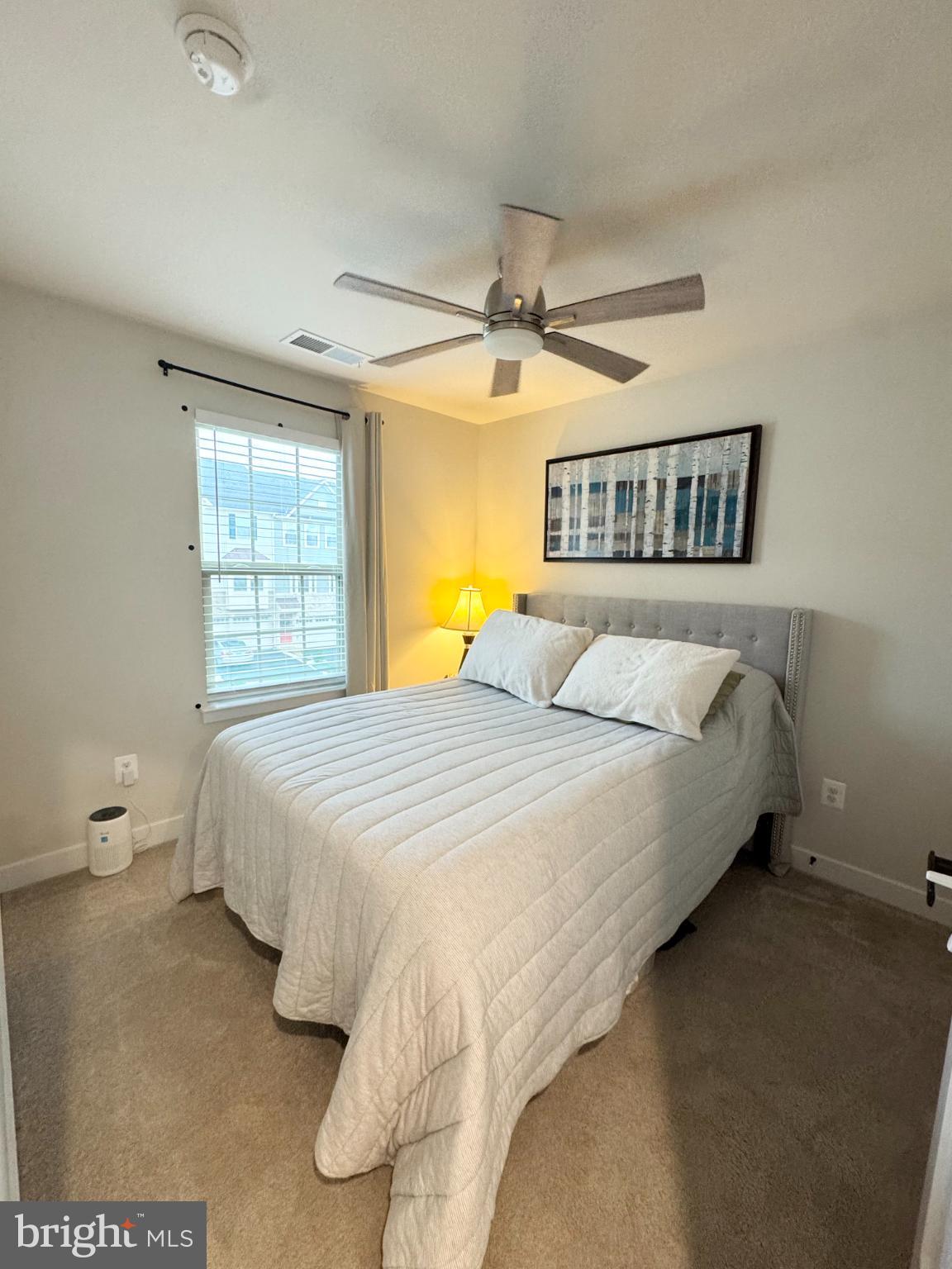 10706 Lamoka Lane New Market, MD 21774 - Photo 17 of 27 a bedroom with a bed and window