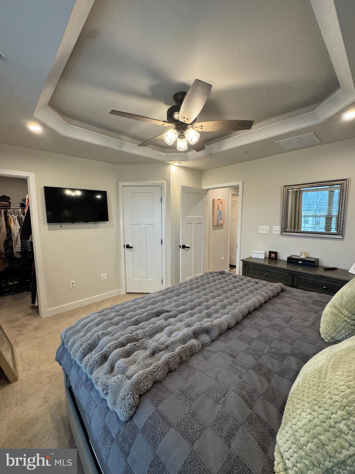 10706 Lamoka Lane New Market, MD 21774 - Photo 20 of 27 a bedroom with bed and a large mirror