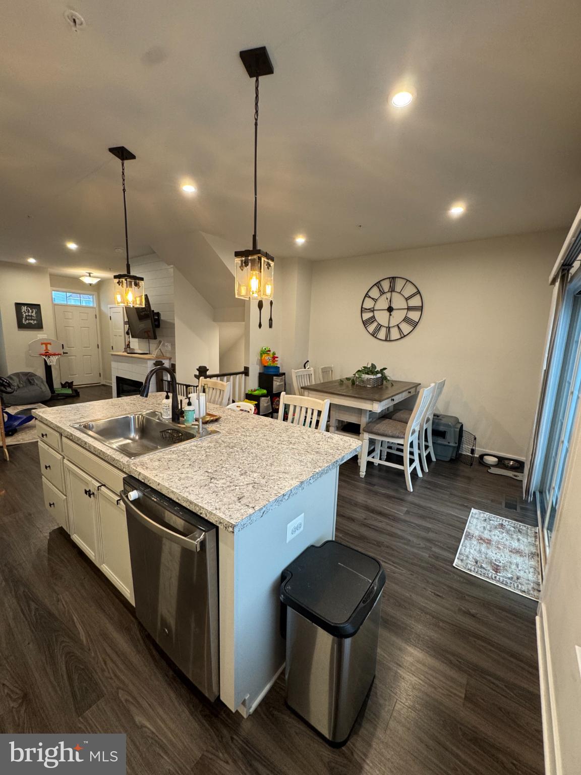 10706 Lamoka Lane New Market, MD 21774 - Photo 4 of 27 a open kitchen with stainless steel appliances granite countertop a stove and wooden floor