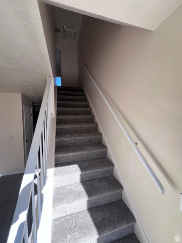 556 North Fairfield Road, Unit D4 Layton, UT 84041 - Photo 10 of 23 View of stairway