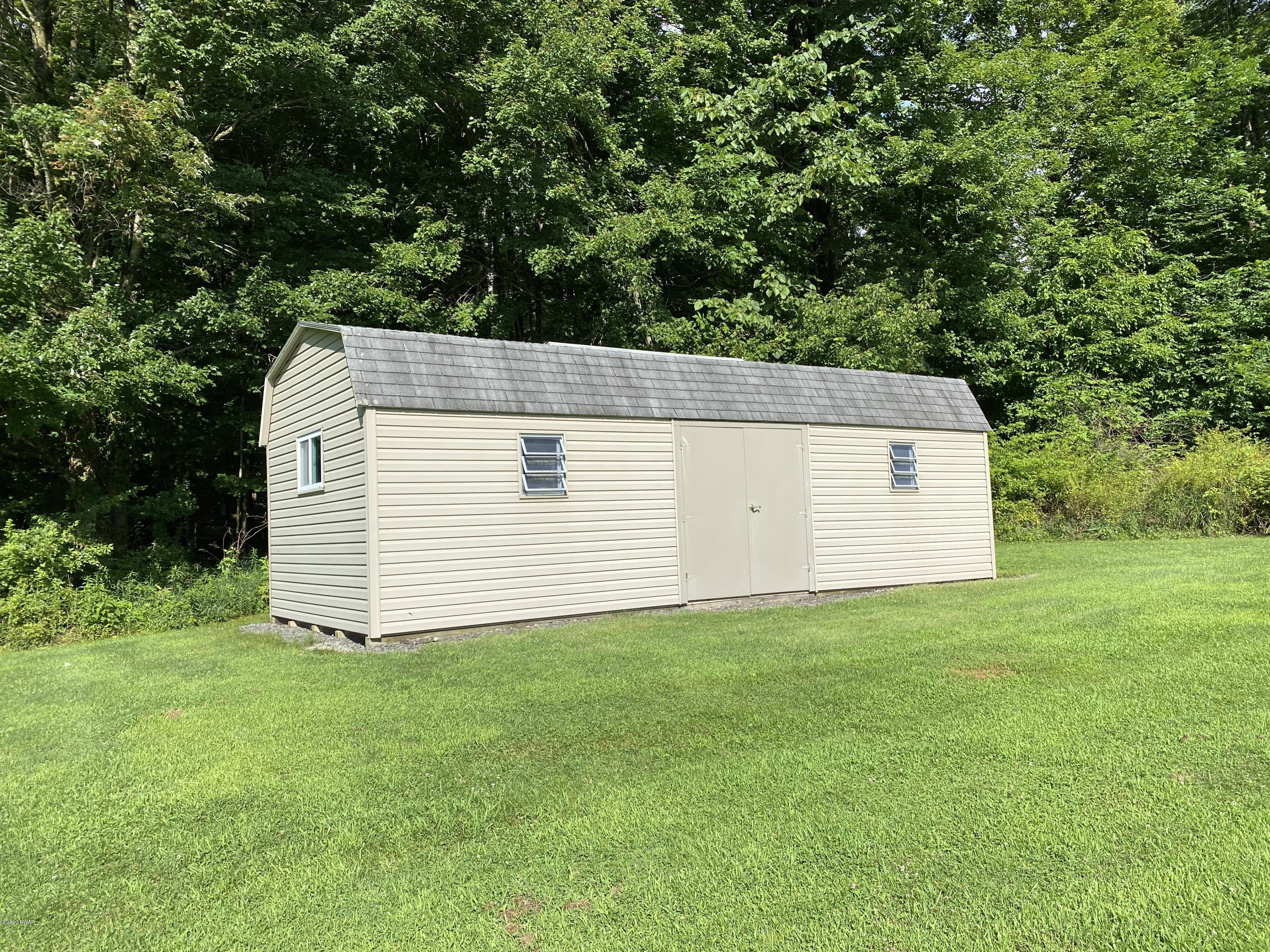 283 Mill Brook Road Waymart, PA 18472 - Photo 23 of 30 a view of a backyard