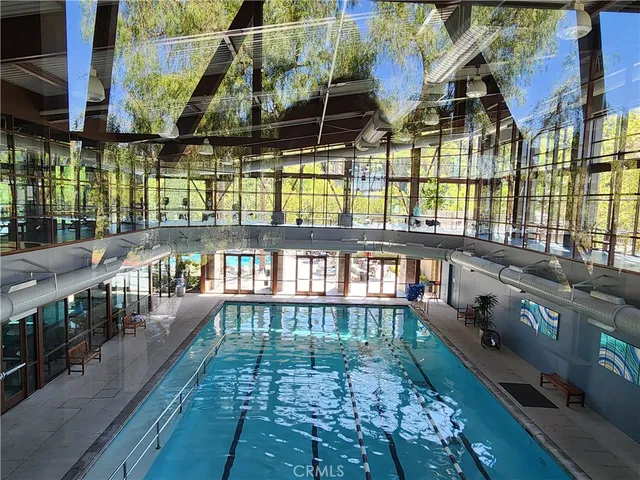 a view of a porch with wooden floor