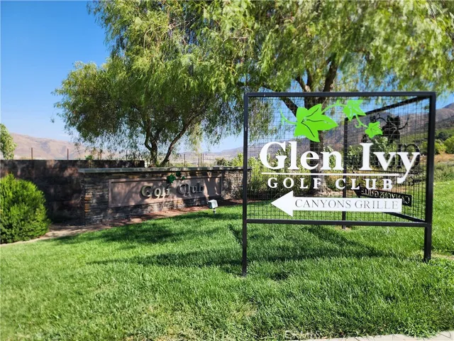 a view of park with bench and trees