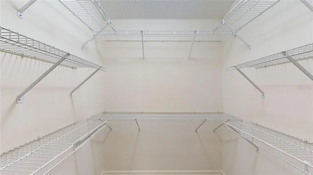 a view of a room with racks on the wall