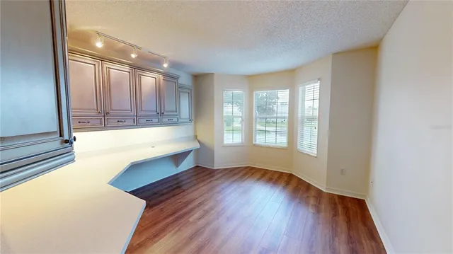 a bathroom with a large tub and sink