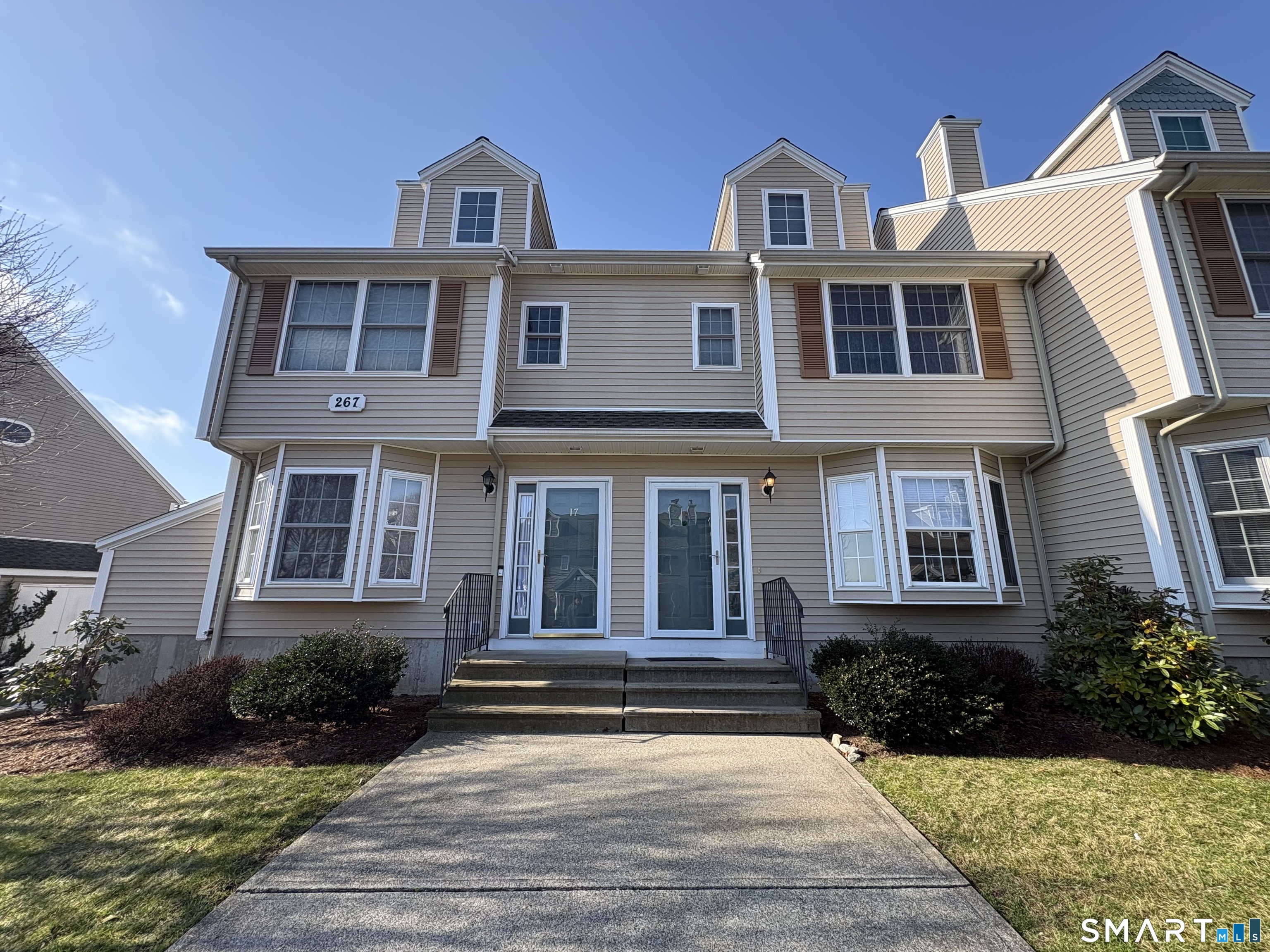 a view of multiple house with a yard